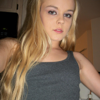 Amateur petite blonde Bri Skies gets naked in the kitchen
