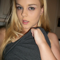 Amateur petite blonde Bri Skies gets naked in the kitchen