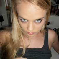 Amateur petite blonde Bri Skies gets naked in the kitchen