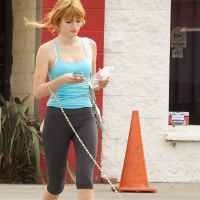 Bella Thorne wearing tiny blue top and leggings on the way at gym in Los Angeles