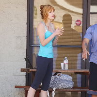 Bella Thorne wearing tiny blue top and leggings on the way at gym in Los Angeles