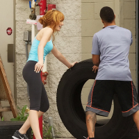 Bella Thorne wearing tiny blue top and leggings on the way at gym in Los Angeles