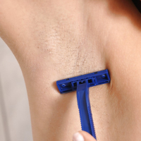 Gorgeous brunette slut Blue Angel shaving her armpits in the bathroom