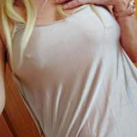 Blonde cutie Natalie K takes pictures of her tits and pussy