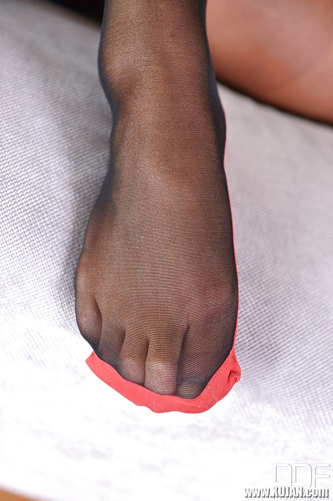 Leggy European babe Natalia Forrest freeing barefeet from pantyhose - Photo #1262255