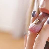 Pretty solo babe Natalia Forrest showing off pierced tongue up close