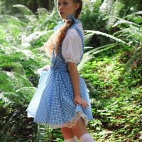 Sexy Dolly Little removes her Dress in the Forest