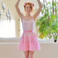 Ballerina Dolly Little is toying her shaved Pussy