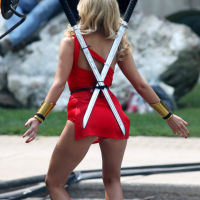 Ashley Benson shows off her ass and cleavage wearing a skimpy red outfit on the