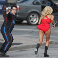 Ashley Benson showing ass and sweaty crotch in tiny red costume at the Pixels se