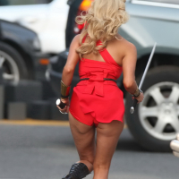 Ashley Benson showing ass and sweaty crotch in tiny red costume at the Pixels se
