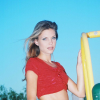 Ashley is outside on the play ground in tight jeans and a tiny red top I love to