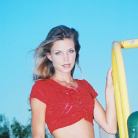Ashley is outside on the play ground in tight jeans and a tiny red top I love to