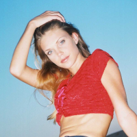 Ashley is outside on the play ground in tight jeans and a tiny red top I love to