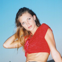 Ashley is outside on the play ground in tight jeans and a tiny red top I love to