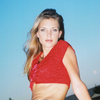 Ashley is outside on the play ground in tight jeans and a tiny red top I love to
