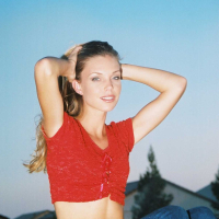 Ashley is outside on the play ground in tight jeans and a tiny red top I love to