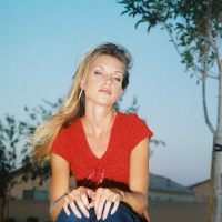 Ashley is outside on the play ground in tight jeans and a tiny red top I love to