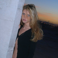 Ashley outside black top red long skirt