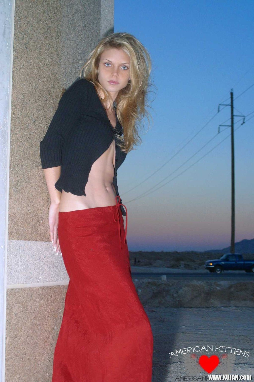 Ashley outside black top red long skirt - Photo #1304353