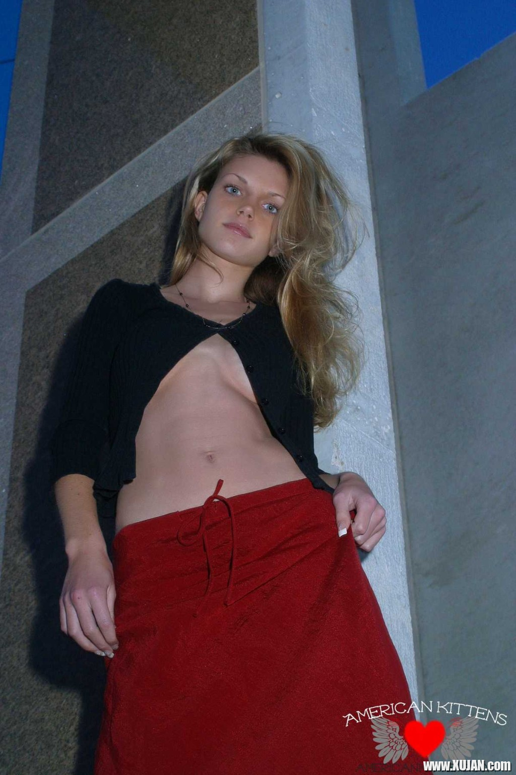 Ashley outside black top red long skirt - Photo #1304360