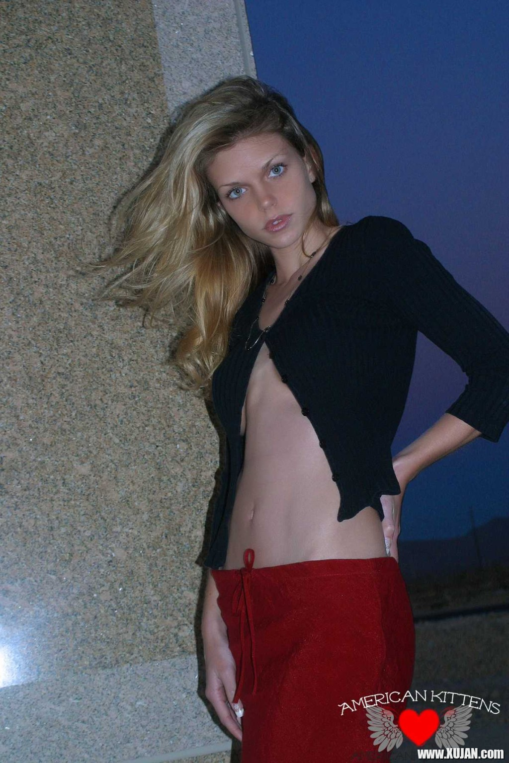 Ashley outside black top red long skirt - Photo #1304366