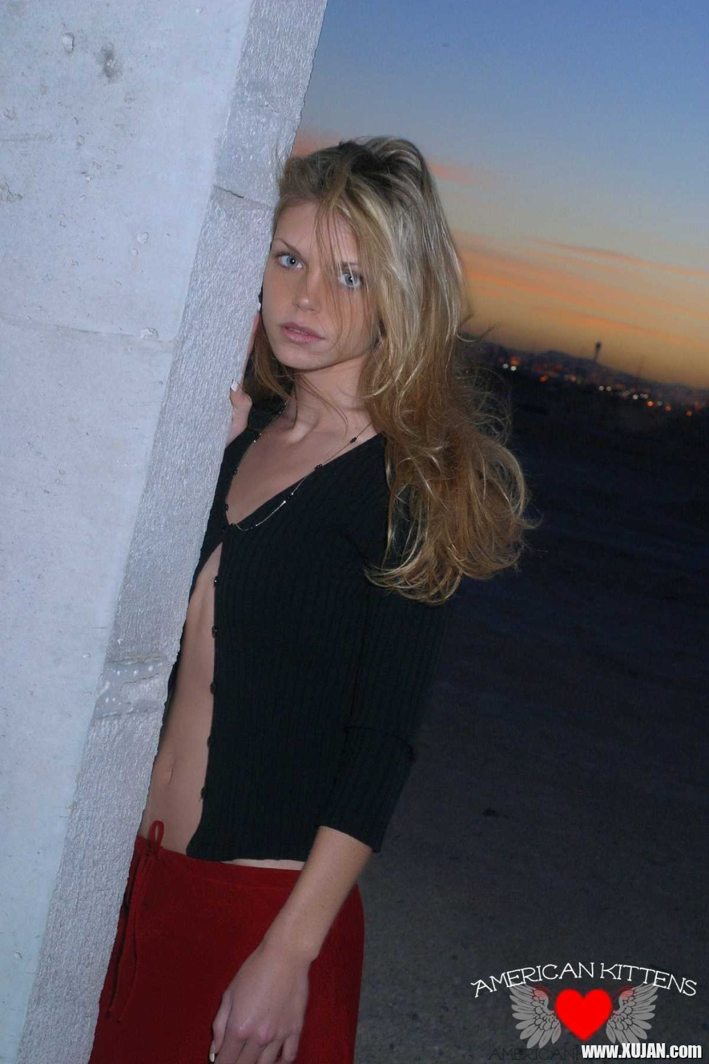 Ashley outside black top red long skirt - Photo #1304367