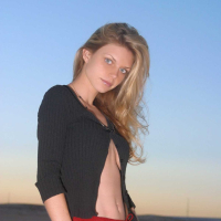 Ashley outside black top red long skirt