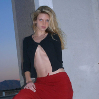 Ashley outside black top red long skirt