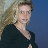 Ashley outside black top red long skirt