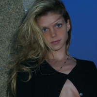 Ashley outside black top red long skirt