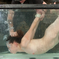 Juliette March in tight rope bondage gets a brutal water treatme