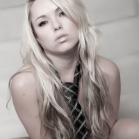 Sexy Trisha Uptown posing wearing only a Mans Tie