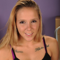 Petite babe Hollie Mack spreading her shaved pussy