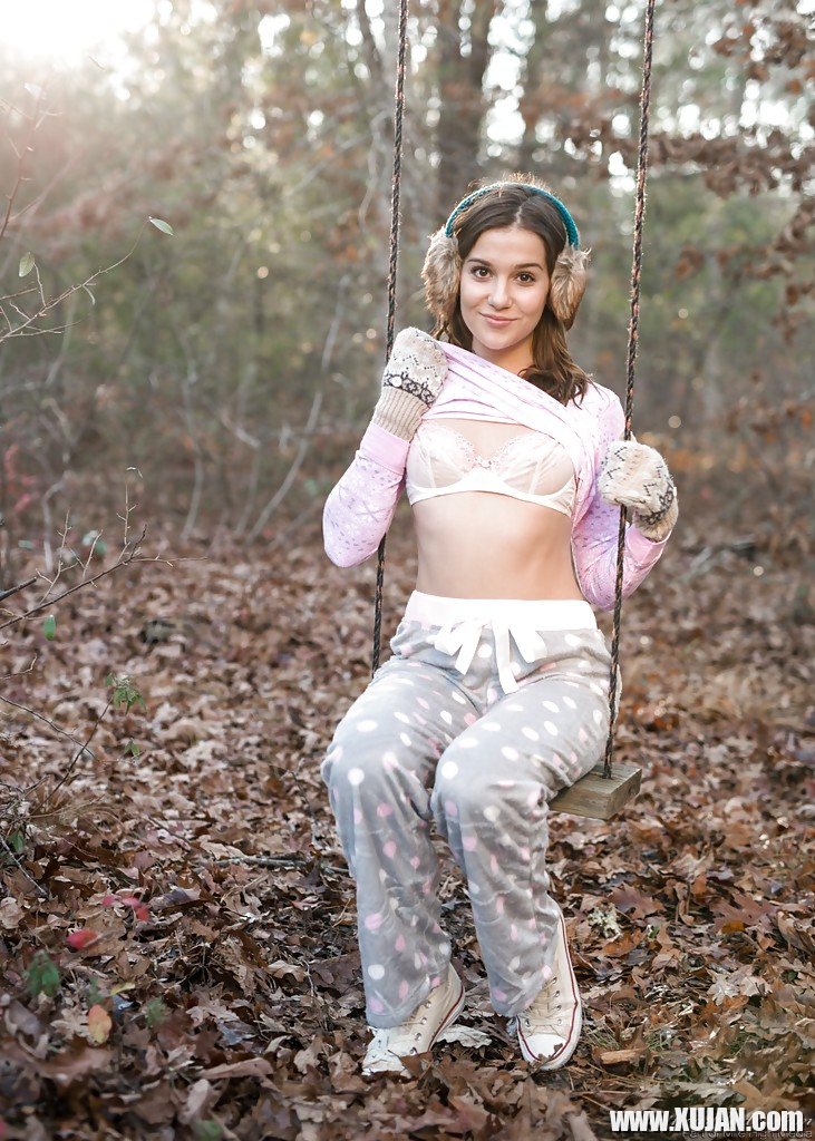 Solo girl Kasey Warner undressing for nude shoot outdoors in woods clearing - Photo #1330992