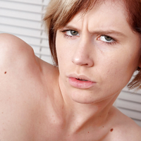 Short haired blonde first timer Kelly Klass receiving cunnilingus