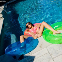 Catalina Cruz spreading in the pool