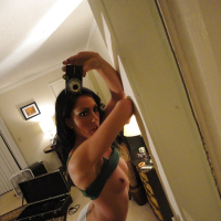 Amateur girlfriend Tiffany Brookes posing and taking photos of herself