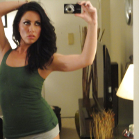 Solo girl Tiffany Brookes unveiling small breasts while taking selfies