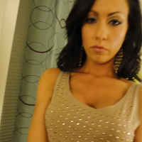 Amateur MILF with small tits Tiffany Brookes spreading her cunt