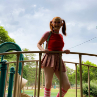 Cute looking Cherry Fae showing her sexy body outdoors