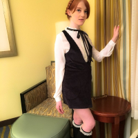 Redhead chick Cherry Fae takes off her clothes and shows her sexy figure