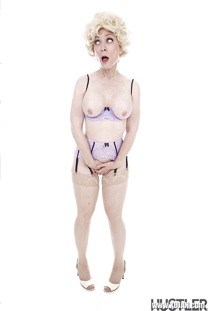 Experienced pornstar Nina Hartley posing topless in sexy lingerie - Photo #1349108