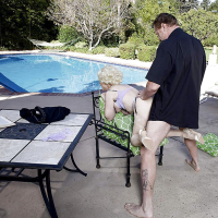 Older pornstar Nina Hartley having her vagina ate out beside pool