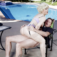 Older pornstar Nina Hartley having her vagina ate out beside pool