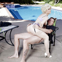 Older pornstar Nina Hartley having her vagina ate out beside pool