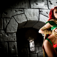 Busty redhead Britney Amber modeling topless in cosplay outfit