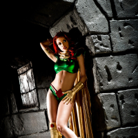 Busty redhead Britney Amber modeling topless in cosplay outfit
