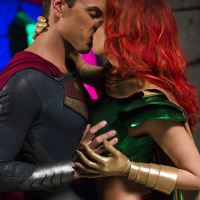 Chesty cosplay redhead Britney Amber taking a cumshot on her tongue