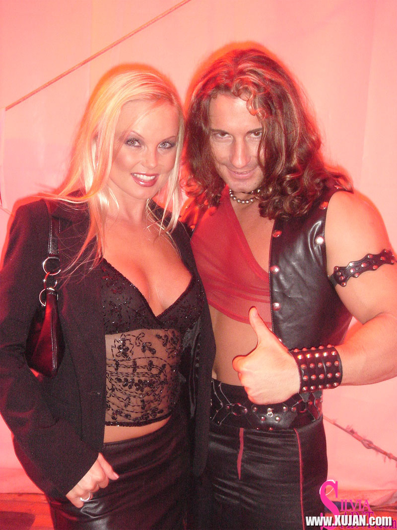 Blonde MILF Silvia Saint fully clothed posing flaunting big tits at party - Photo #1357162